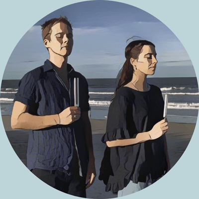 Woman using a tuning fork for sound healing meditation at home